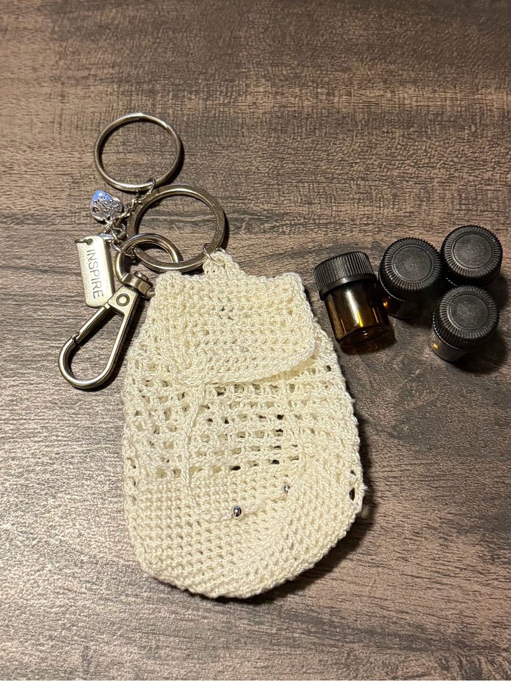 Handmade Crochet Backpack Keychain with Small Essential Oil Bottles..